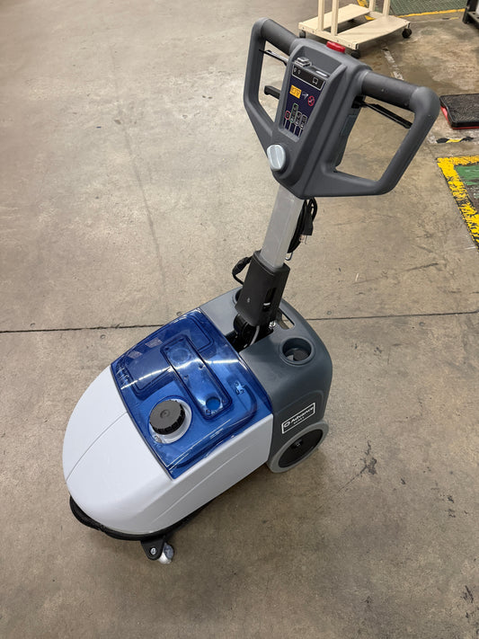Compact floor scrubber